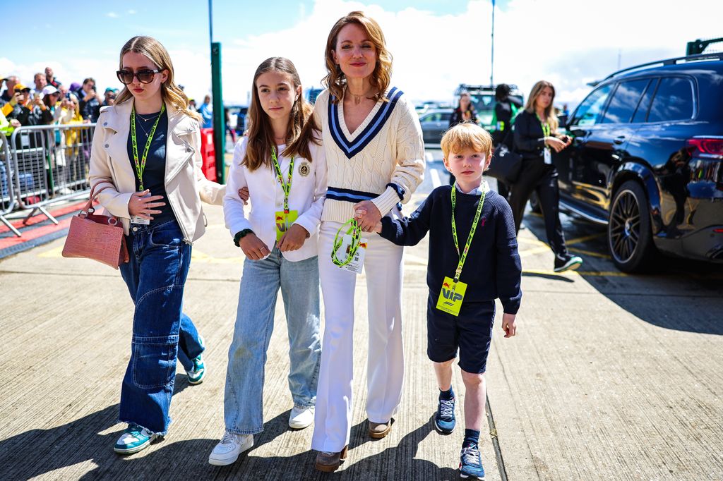 Geri Horner arrives with her family in the paddock during the F1 Grand Prix of Great Britain at Silverstone Circuit on