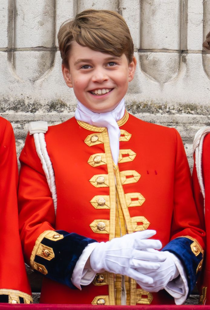 Prince George smiling on balcony after coronation