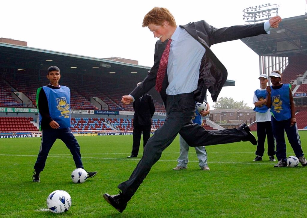 Prince Harry takes a penalty at Upton Park
