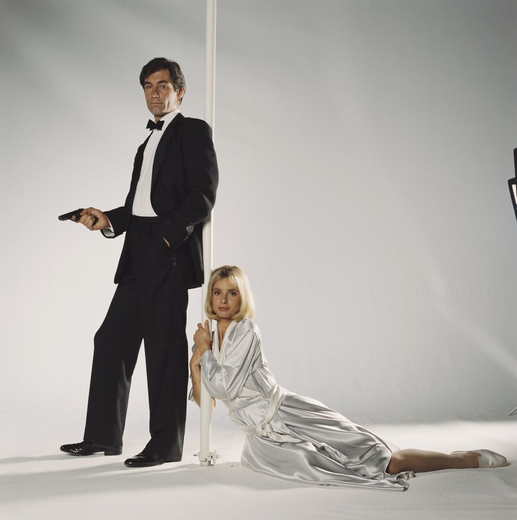 Timothy Dalton as 007 and Maryam d'Abo as Kara Milovy 