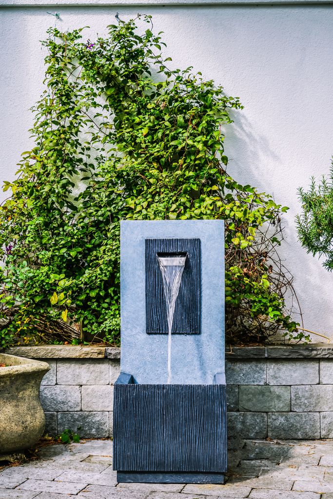 A water feature on a garden patio