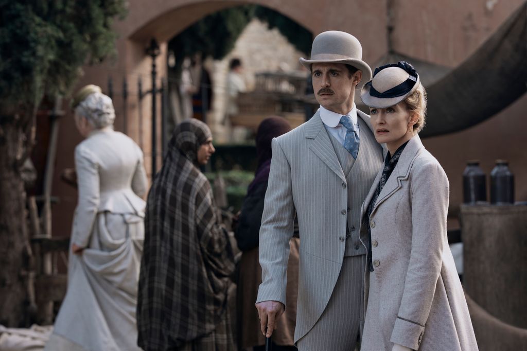 man and woman in 18th century clothing