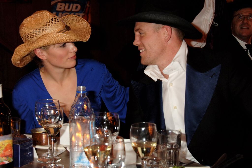 Zara and Mike Tindall smiling in western hats