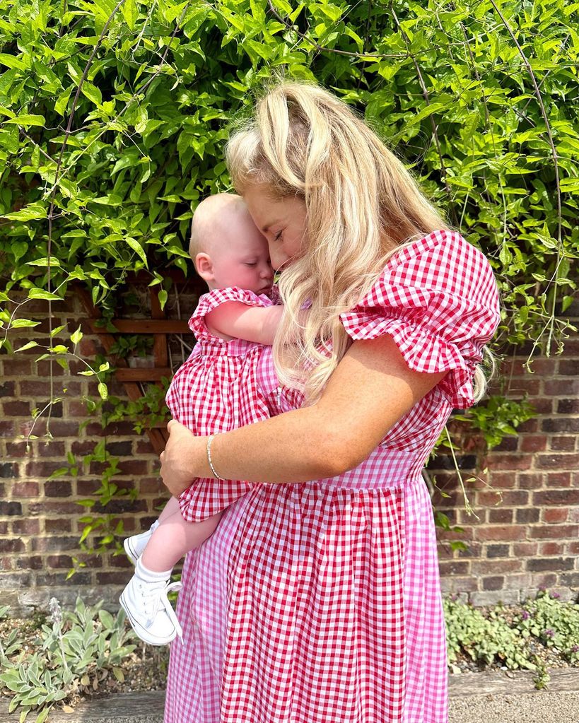 Mother and daughter in matching gingham dresses