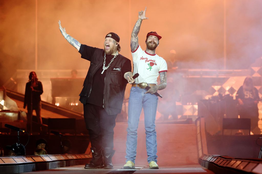 Jelly Roll and Post Malone perform onstage during together