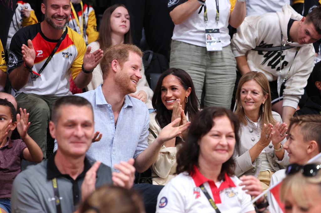 Prince Harry and Meghan attend the sitting volleyball match between Poland and Germany