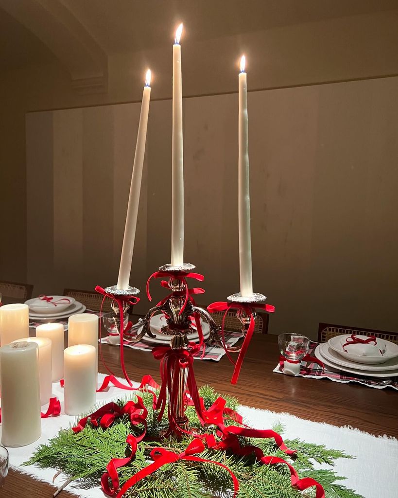 Candles in a candelabra on a Christmas table 