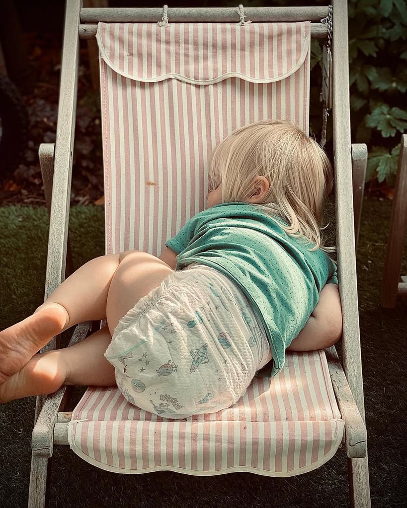 David Tennant's child napping on a chair