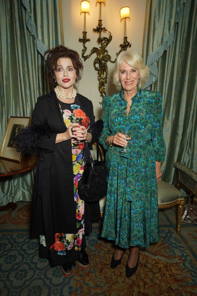 Queen Camilla (R) and Helena Bonham Carter during a reception celebrating 30 years of the Forward Arts Foundation at Clarence House 