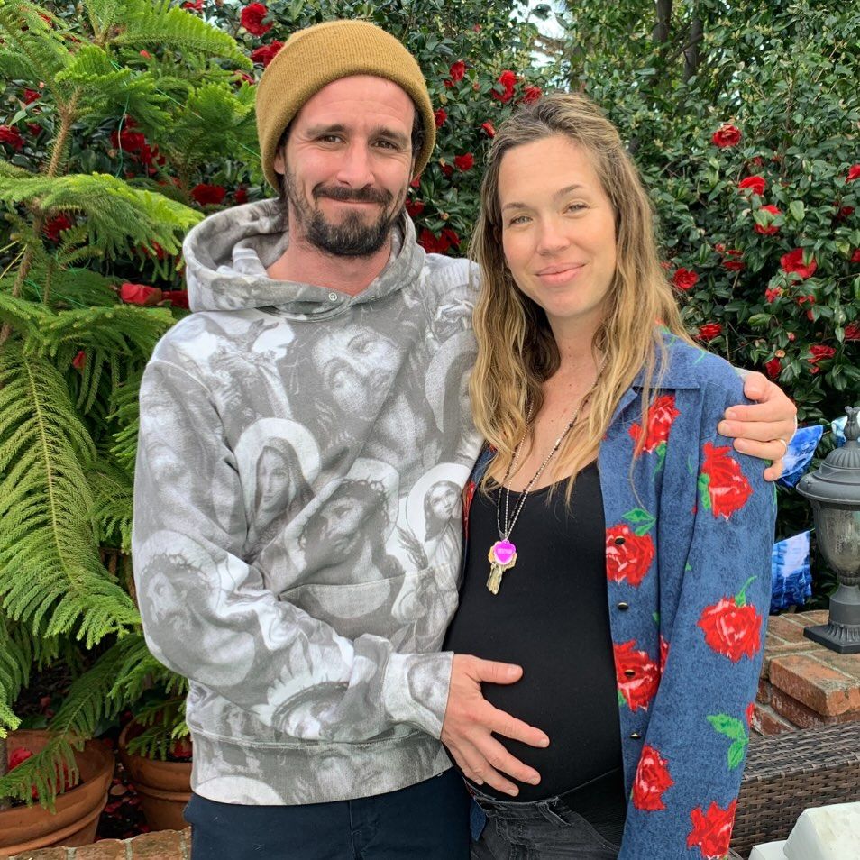 photo of james ransone cradling wife jamie mcphee baby bump