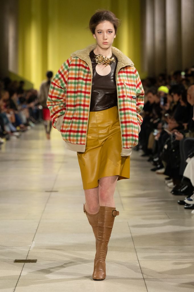 A model on the runway at the Miu Miu Fall RTW 2025 fashion show as part of Paris Fashion Week held at Palais d'Iena on March 11, 2025 in Paris, France