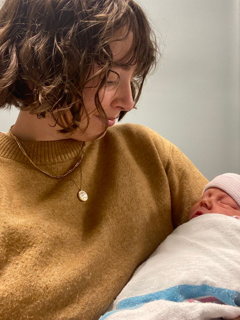The author holding her nephew for the first time