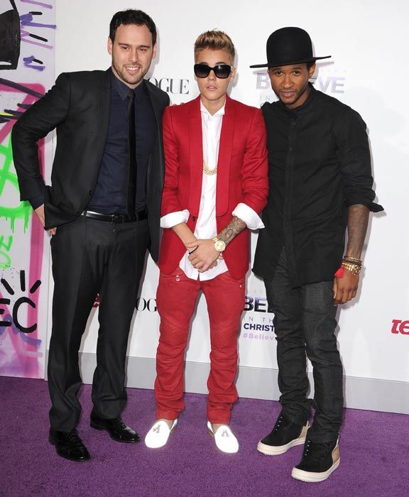 Justin with usher and scooter braun