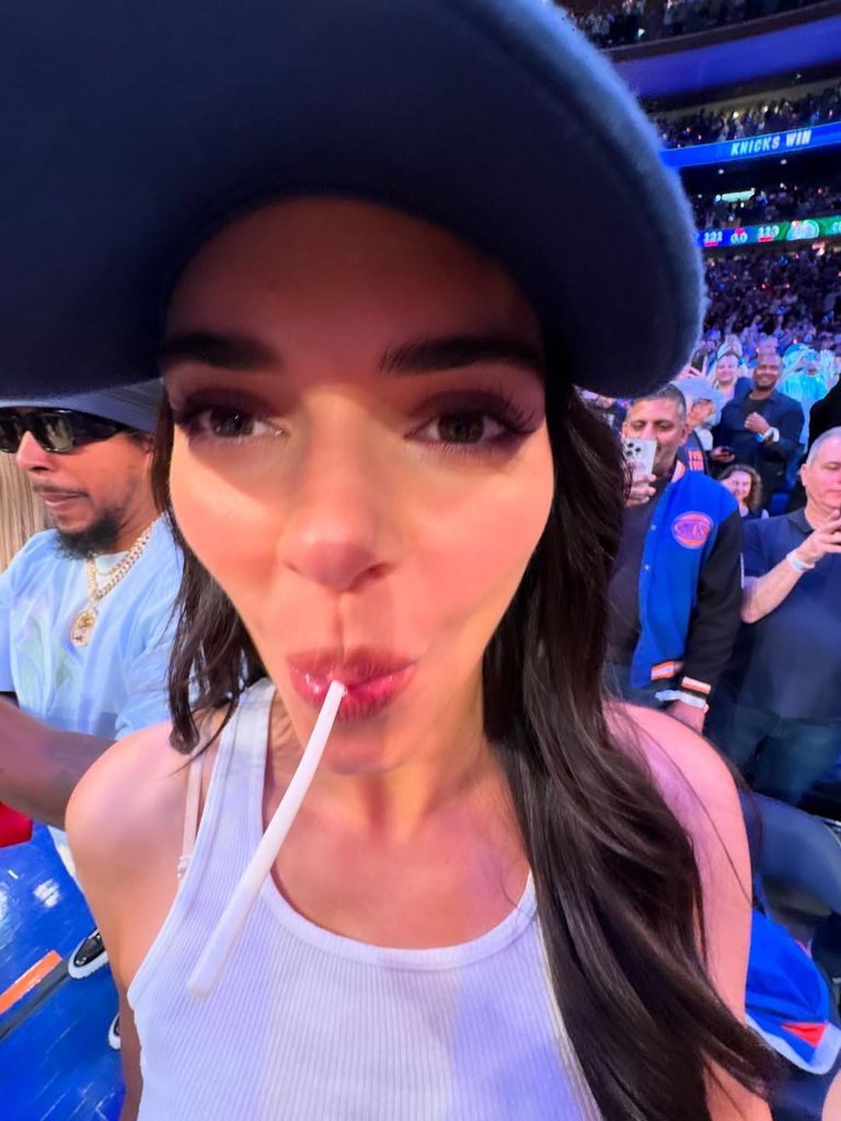 Photo by Kendall Jenner sucks in sweet
