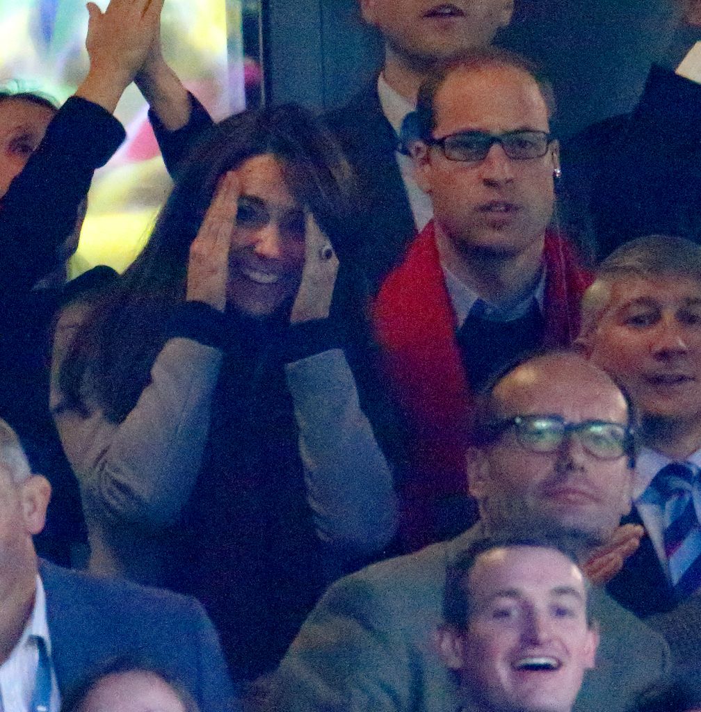 Prince William, Duke of Cambridge and Catherine, Duchess of Cambridge attend the Australia v Wales match during the Rugby World Cup 2015 at Twickenham Stadium on October 10, 2015 in London, England.