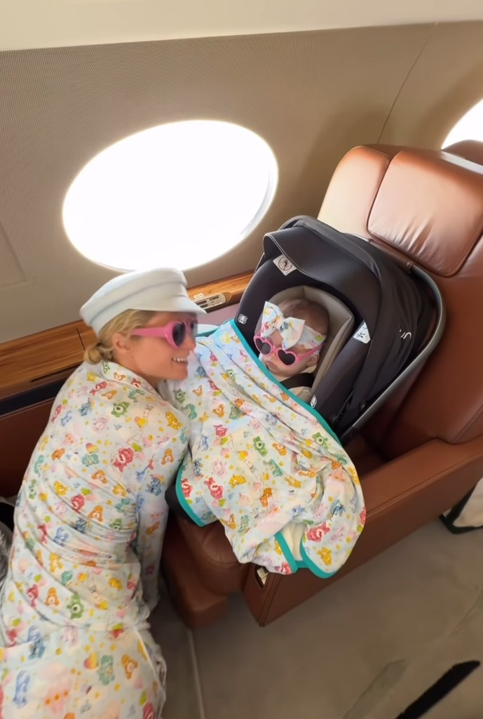 Still from a video shared by Paris Hilton on Instagram July 2024 on a private jet after her daughter's first trip to the city she's named after, London