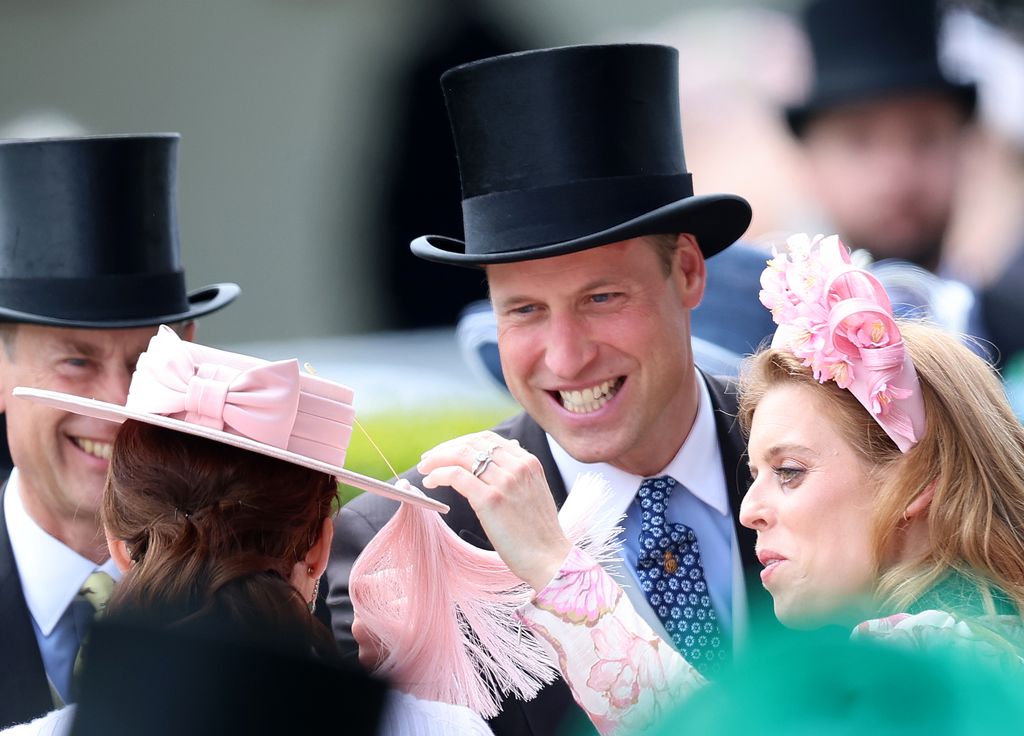 Prince William laughs at Princess Eugenie's hat