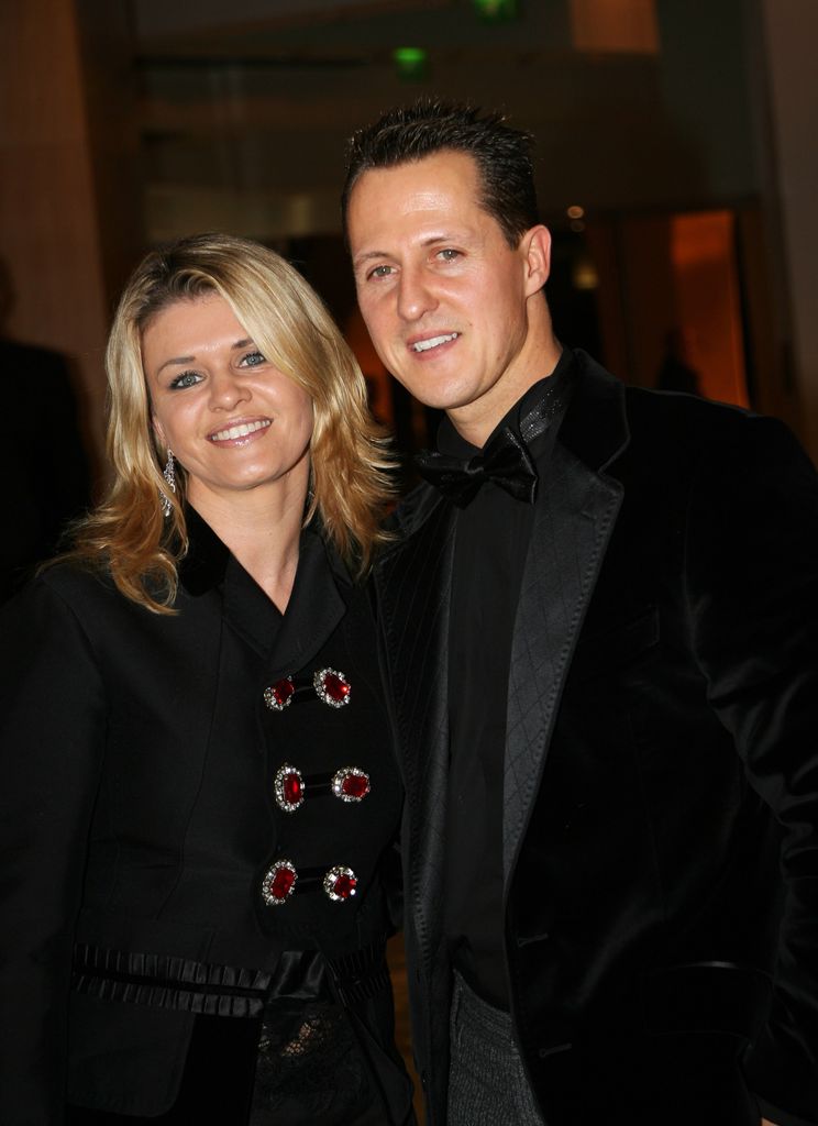 Corinna Schumacher smiling with Michael Schumacher