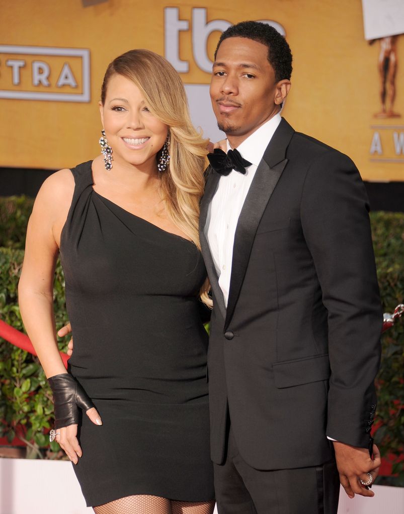 Mariah Carey and actor/TV personality Nick Cannon arrive at the 20th Annual Screen Actors Guild Awards at The Shrine Auditorium on January 18, 2014 in Los Angeles, California