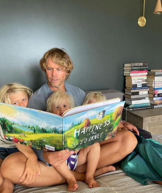 Eric Christian Olsen reading to his kids in bed