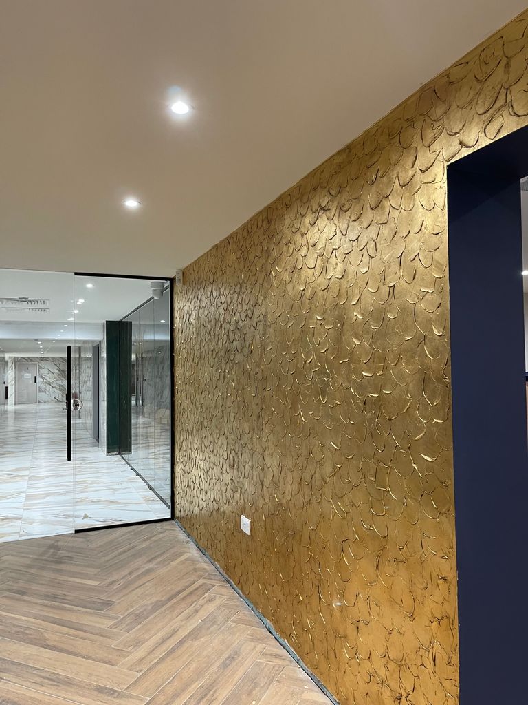 hallway with gold wall