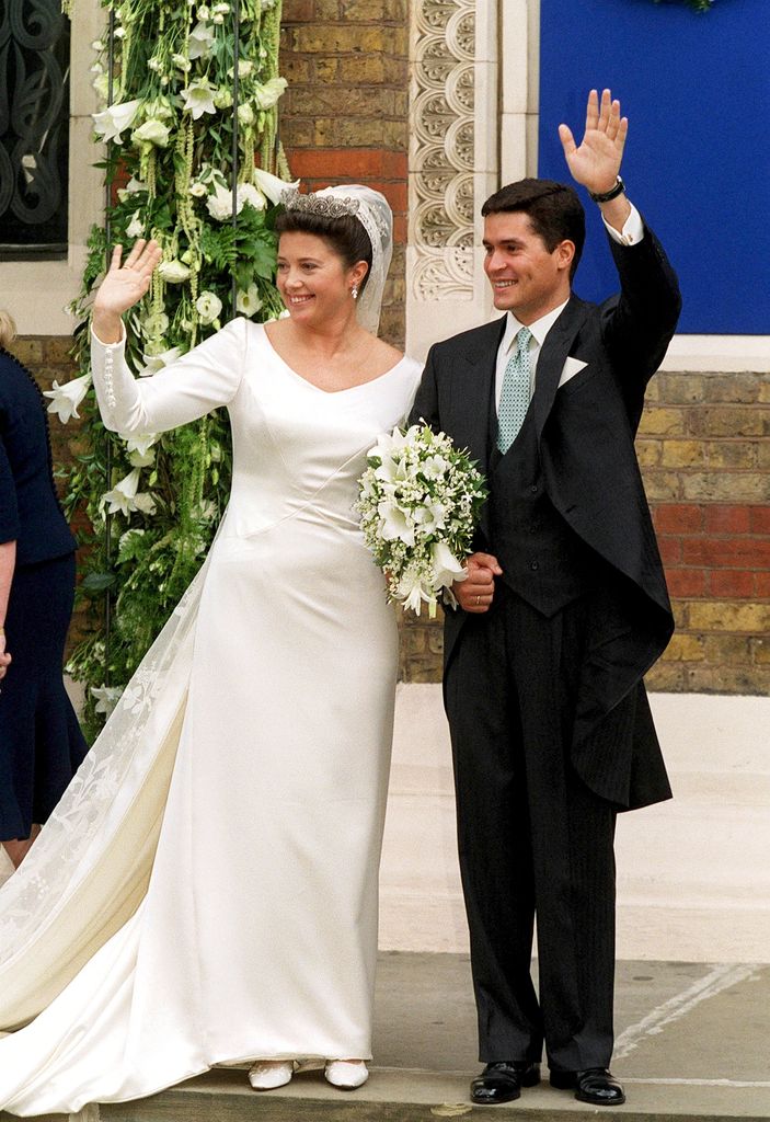 Princess Alexia Of Greece And Carlos Morales Quintana waving on their wedding day