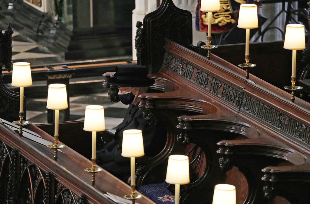 The Queen sits alone at Prince Philip's funeral