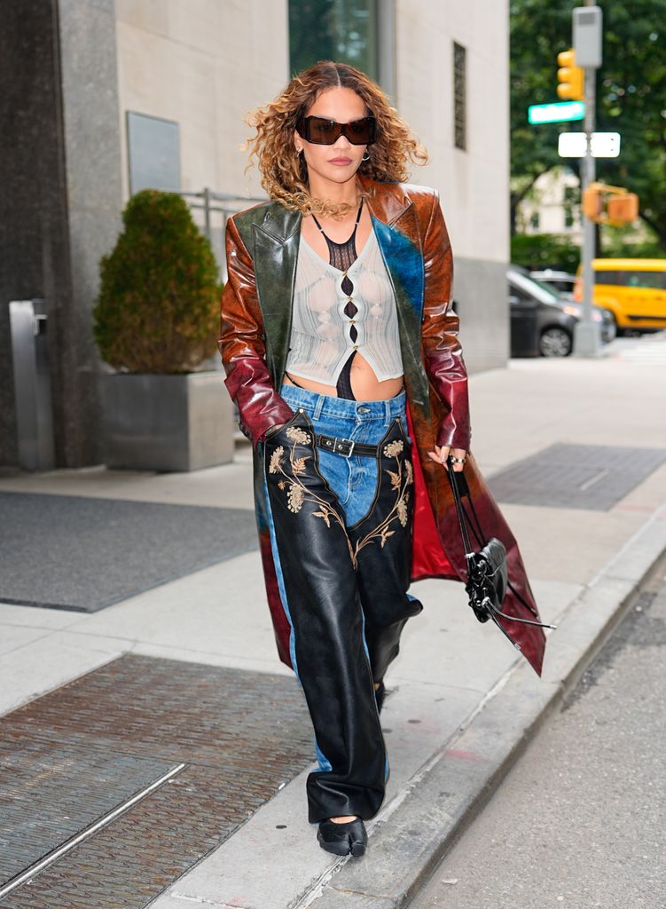 Rita Ora wore Stella McCartney jeans with chap detailing for her New York otuing