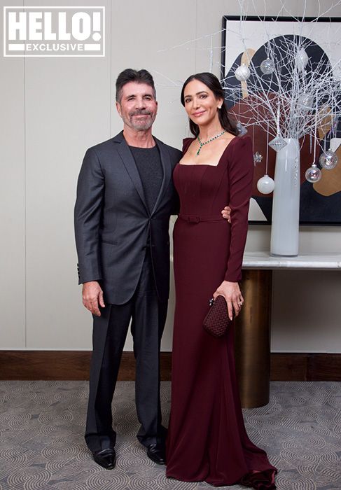 Simon Cowell and Lauren Silverman posing for HELLO! at The Variety Awards