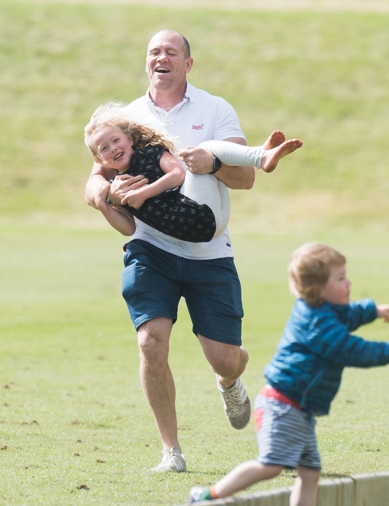 Mike Tindall carrying Savannah Phillips