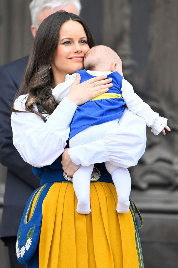 Princess Sofia cuddles baby Ines