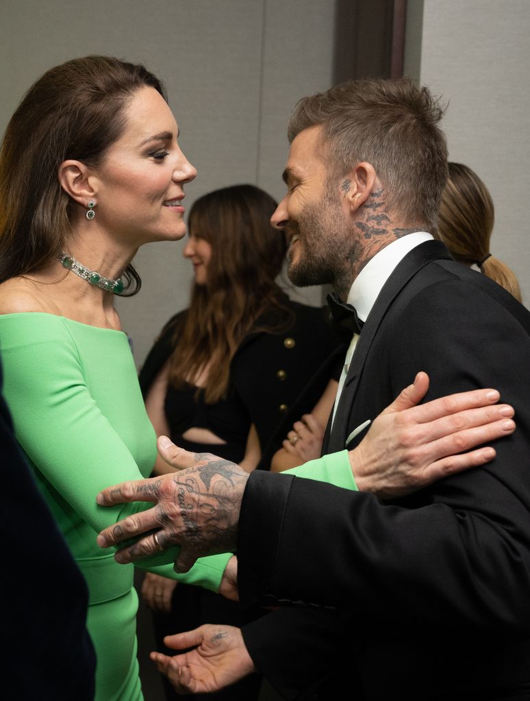 Catherine, Princess of Wales and David Beckham kiss backstage after The Earthshot Prize 2022