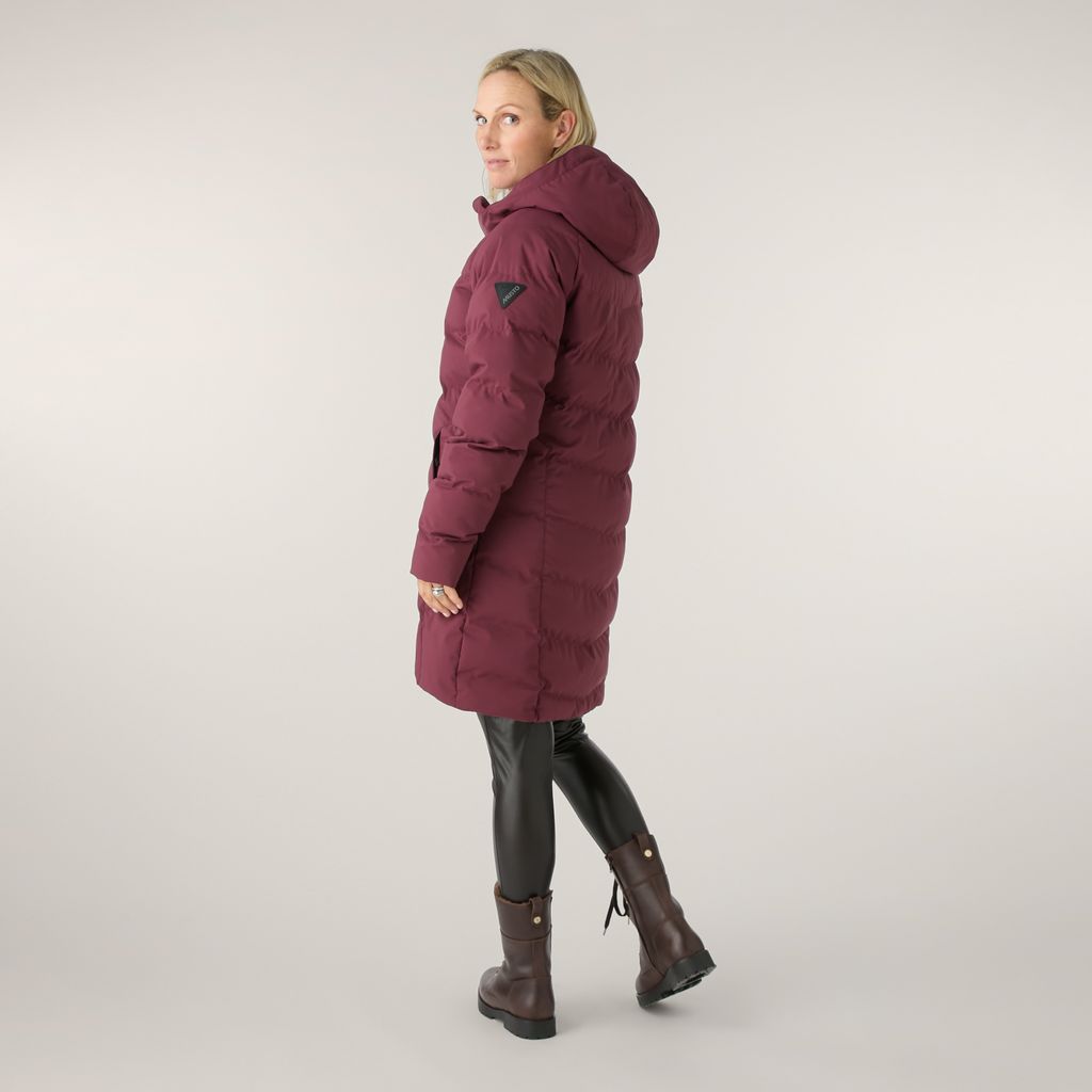 Zara Tindall wearing Musto's Marina Long Quilted Jacket in 'Windsor Wine'
