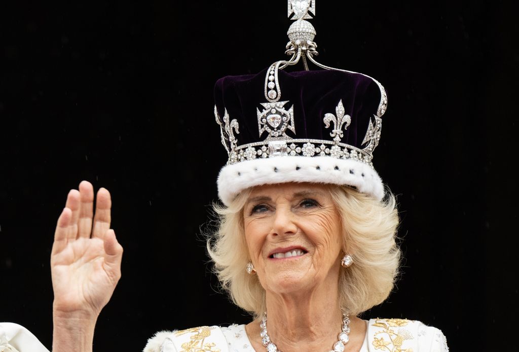 Their Majesties King Charles III And Queen Camilla wave on balcony of Buckingham Palce