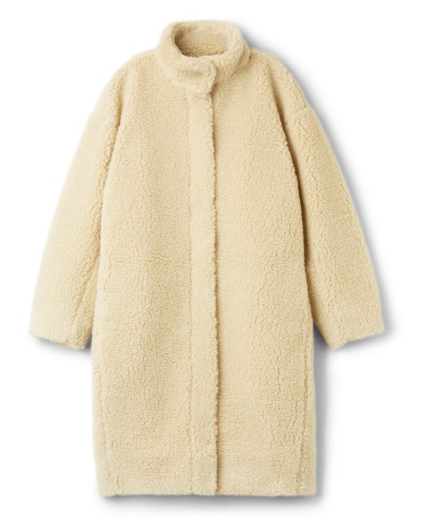 Sienna Miller wears Tory Birch teddy bear coat at New York Fashion Week ...