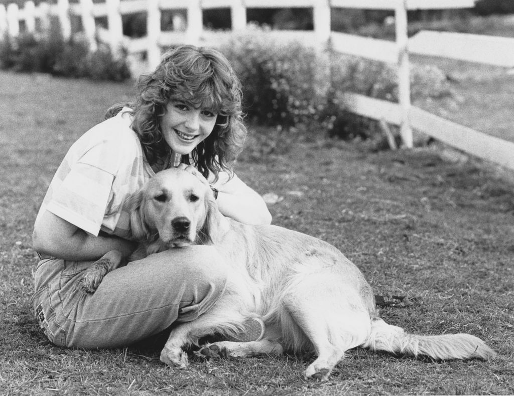 Portrait of presenter Yvette Fielding and the dog Bonnie, photographed for Radio Times in connection with the children's television series 'Blue Peter' at the Downe Court Riding Centre in Kent, June 7th 1988. (Photo by Michelle Smith/Radio Times/Getty Images)