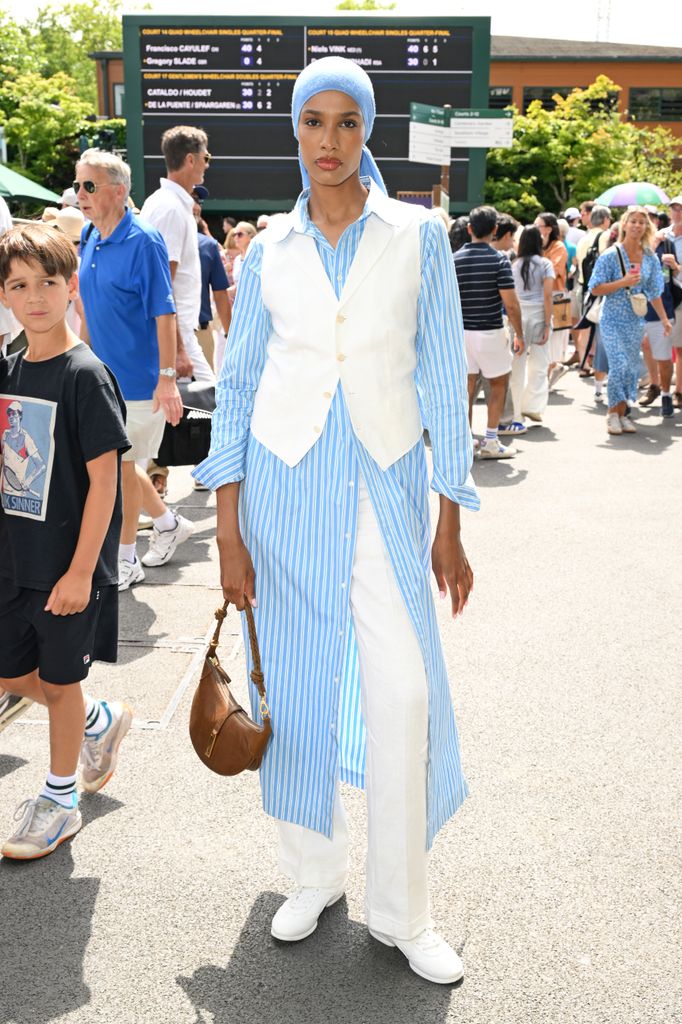 Ikram Abdi Omar, wearing Ralph Lauren, attends day ten of the Wimbledon Tennis Championships at the All England Tennis and Croquet Club at on July 09, 2025 in London, England