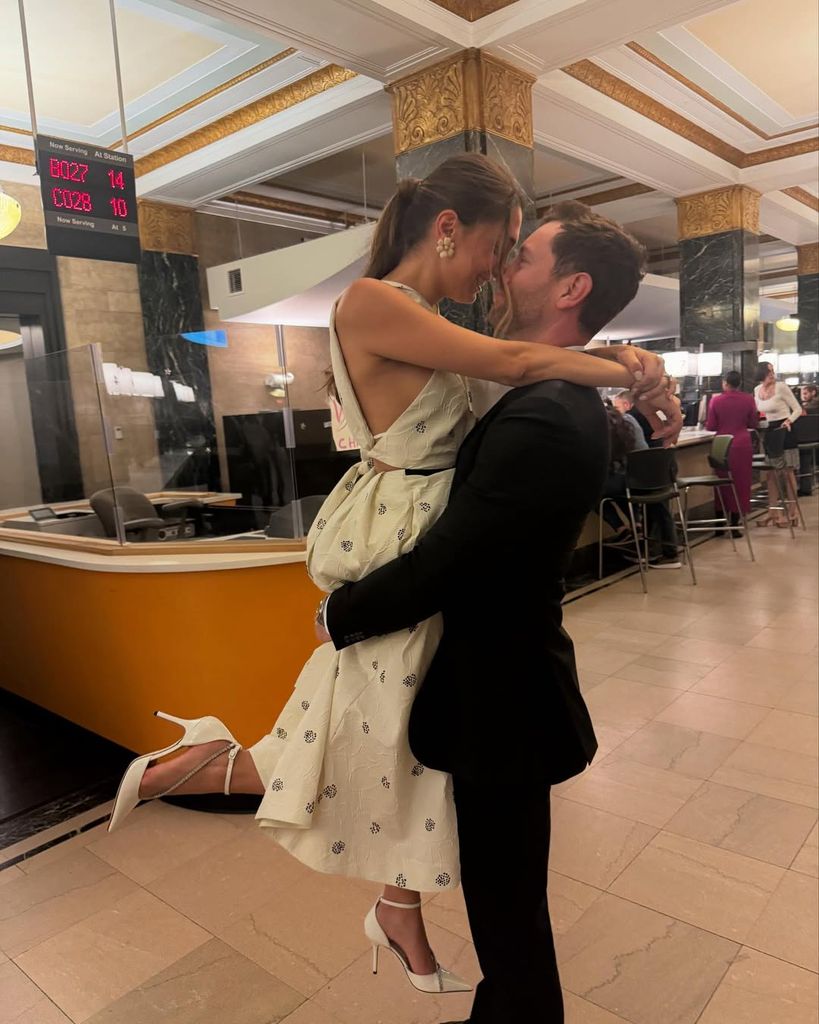 Princess Iman of Iran in the arms of her new husband Brad