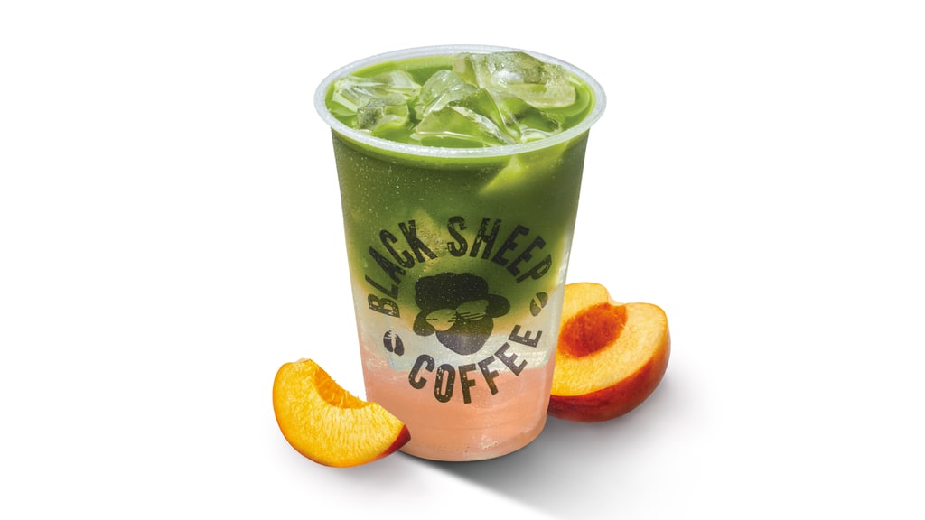 peach matcha lemonade in black sheep cup
