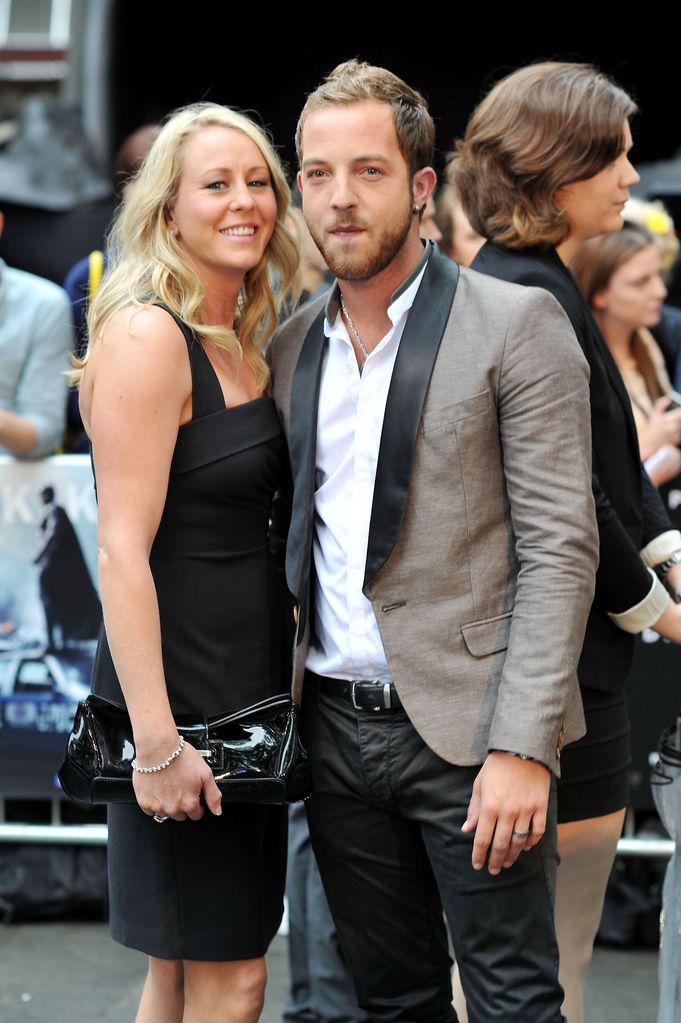 man and woman on red carpet 