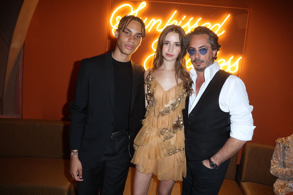 The pair posing with Killian Hennessey, Savannah's father at the launch of his latest perfume during Cannes FIlm Festival