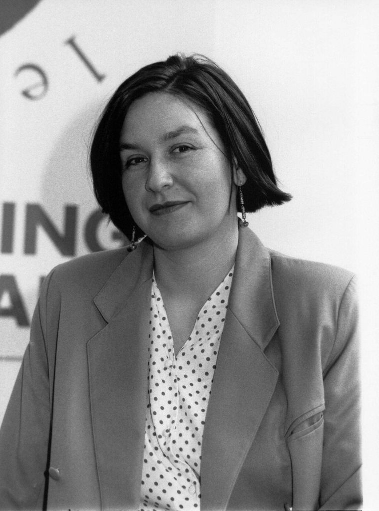 Black-and-white photograph of Nina Temple at a conference