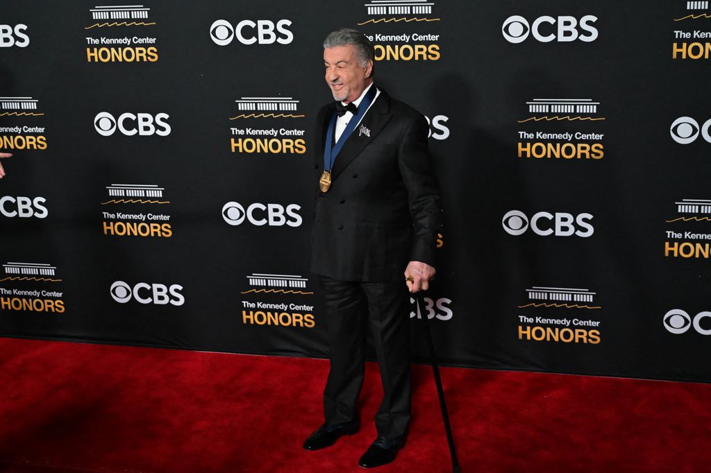 Sylvester Stallone arrives for the 48th Kennedy Center Honors gala with a cane