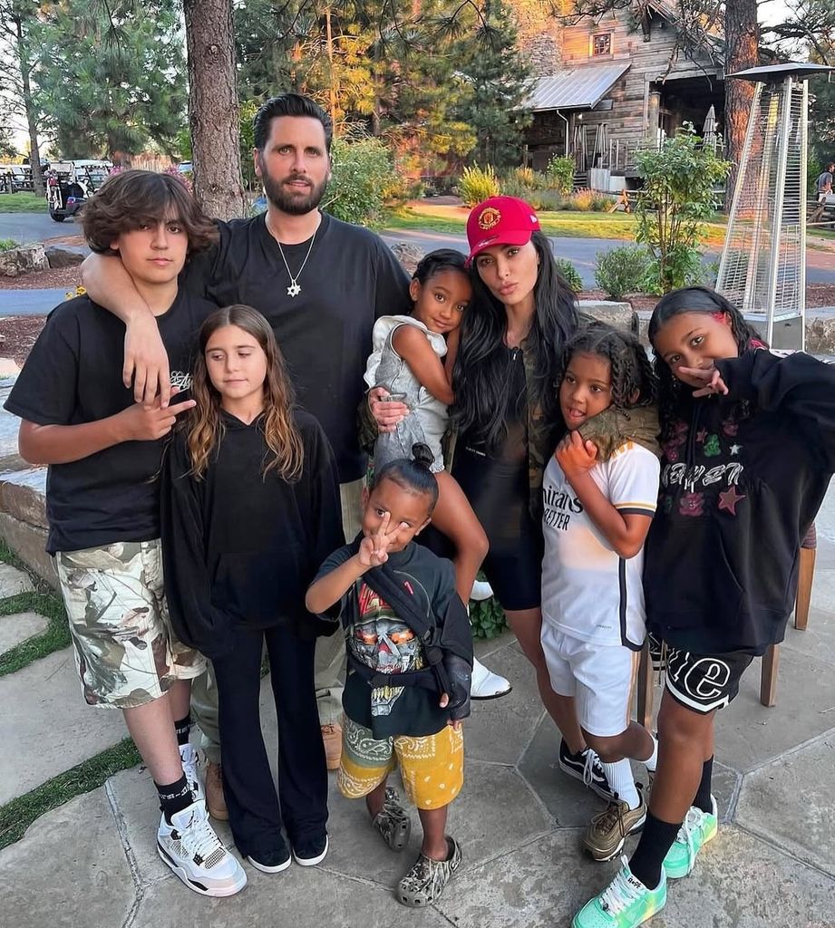 Scott Disick and Kim Kardashian pose with several of the family's children, shared on Instagram