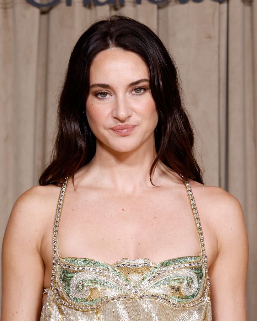 Shailene Woodley posing in a sparkly dress