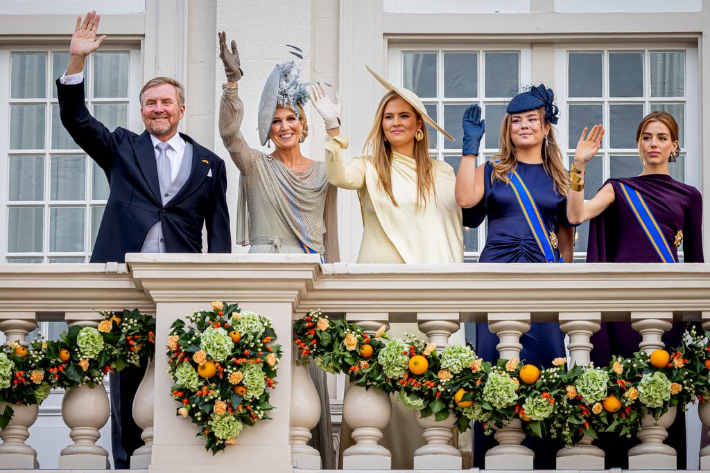 King Willem-Alexander, Queen Maxima, Princess Catharina-Amalia, Princess Ariane and Princess Alexia waving