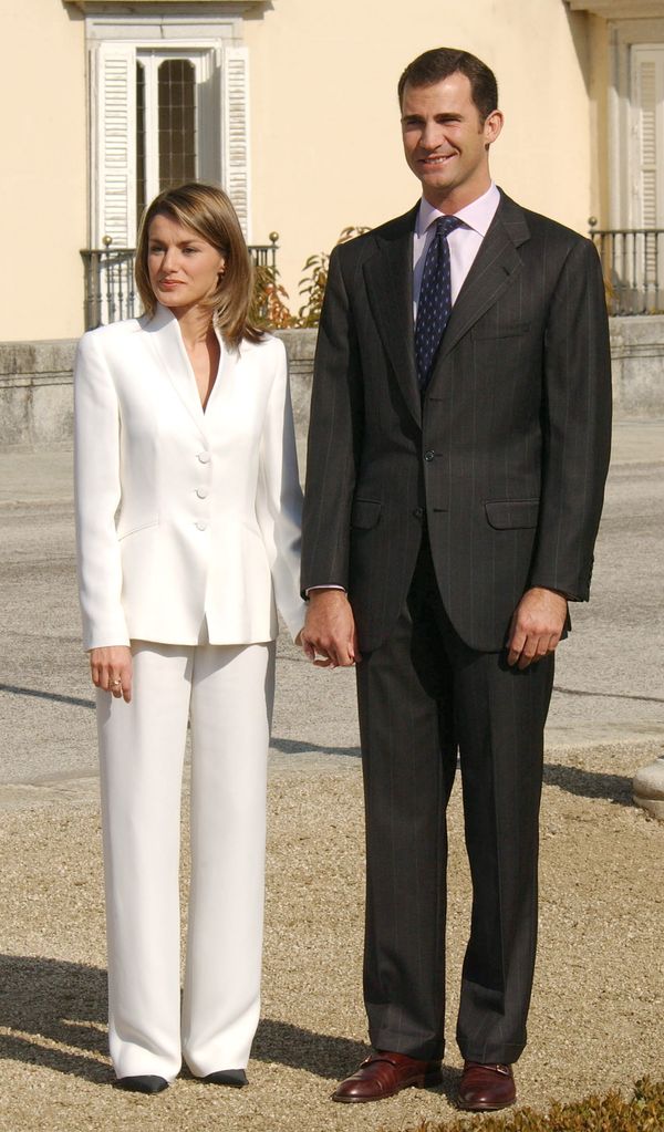 Crown Prince Felipe Of Spain in suit and Letizia Ortiz Rocasolano in white suit