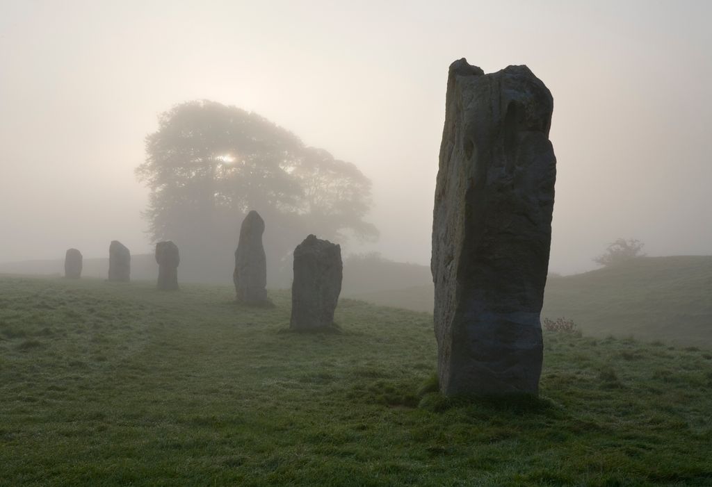 standing stones, fog, pagan, religion, druidism, ancient; history; monument; rock; stone age; megalith, ancient civilization, national landmark; UNESCO; travel destination; traditional culture; archaeology;