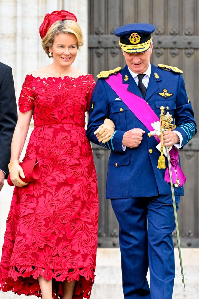 Queen Mathilde in red lace dress