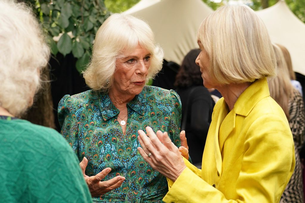 Queen Camilla talking to a group of women